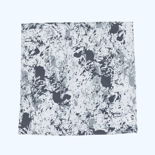 A square scarf featuring a distressed, grunge-style abstract pattern in black and off-white.